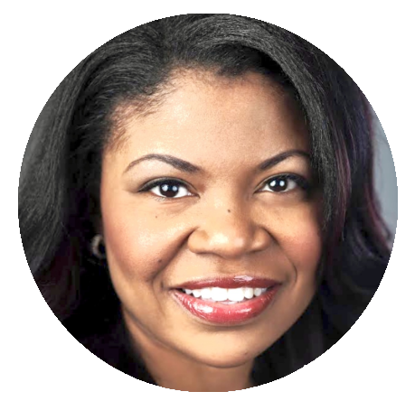 Chaune Fitzgerald a black woman with wavy black hair, brown eyes, and a bright beautiful smile. 