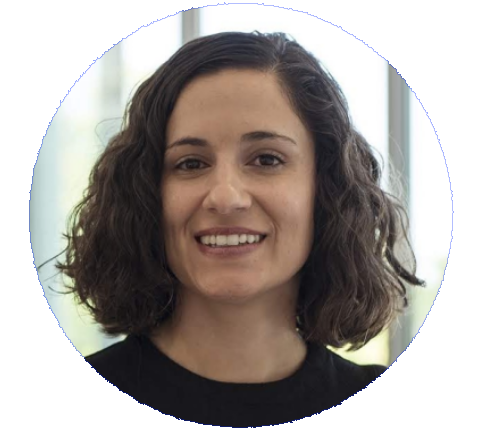 Elizabeth Perez a woman with dark curly hair and brown eyes and a big smile