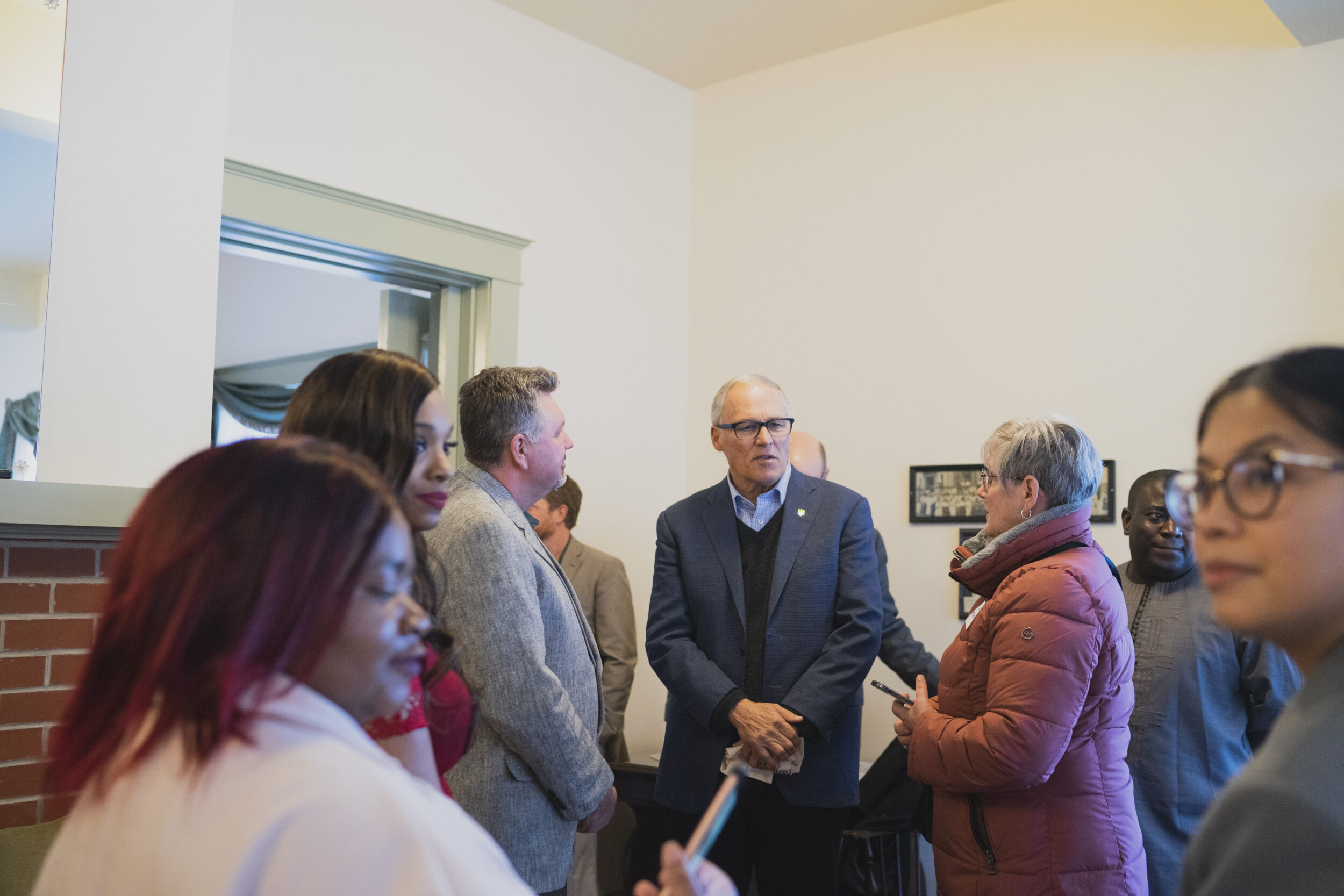 Attendees of the 2023 legislative reception talking with Governor Jay Inslee