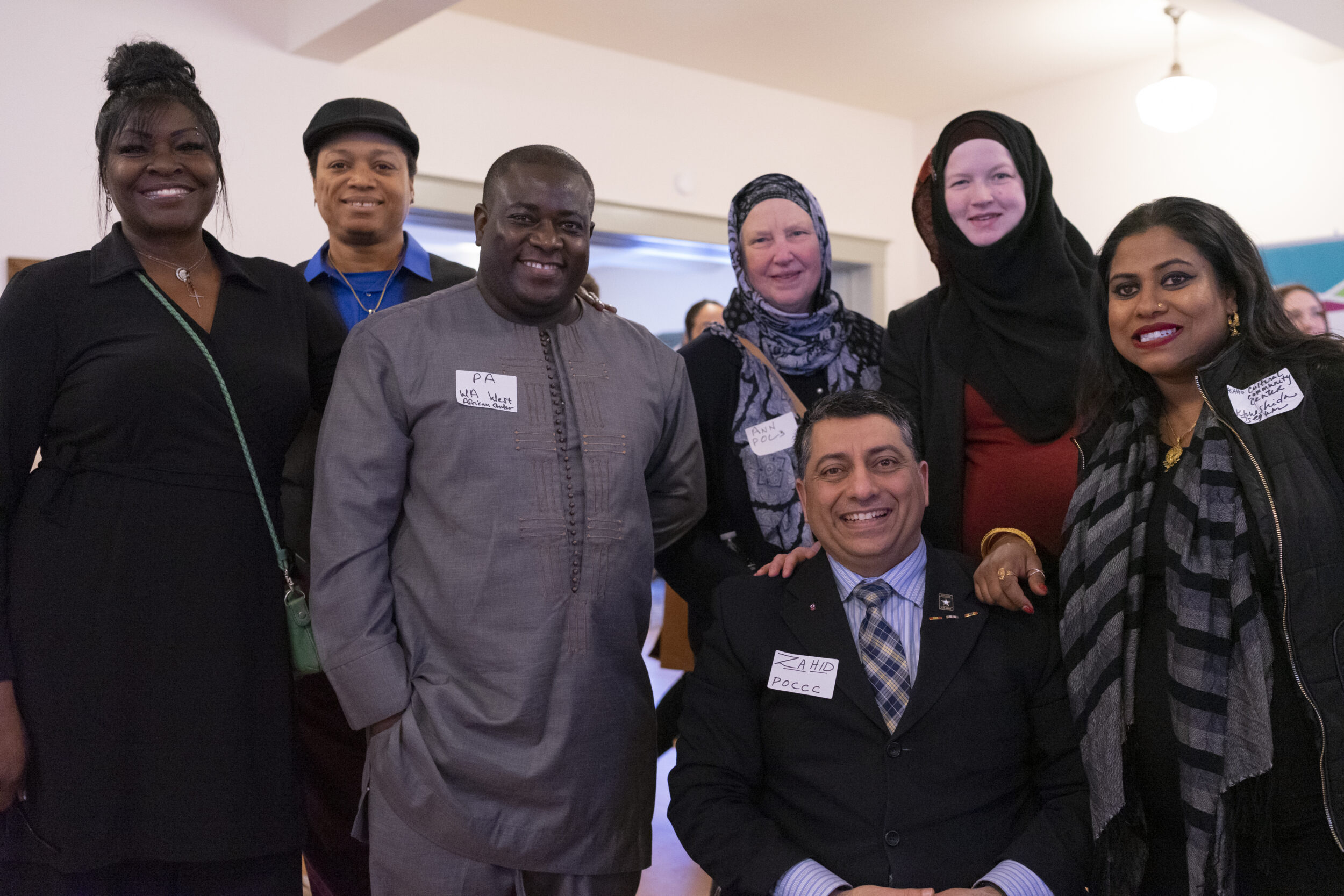 A group of attendees of the 2023 legislative reception smiling. 